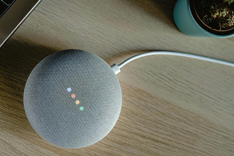 Smart home tech image of a smart home speaker device on a table top